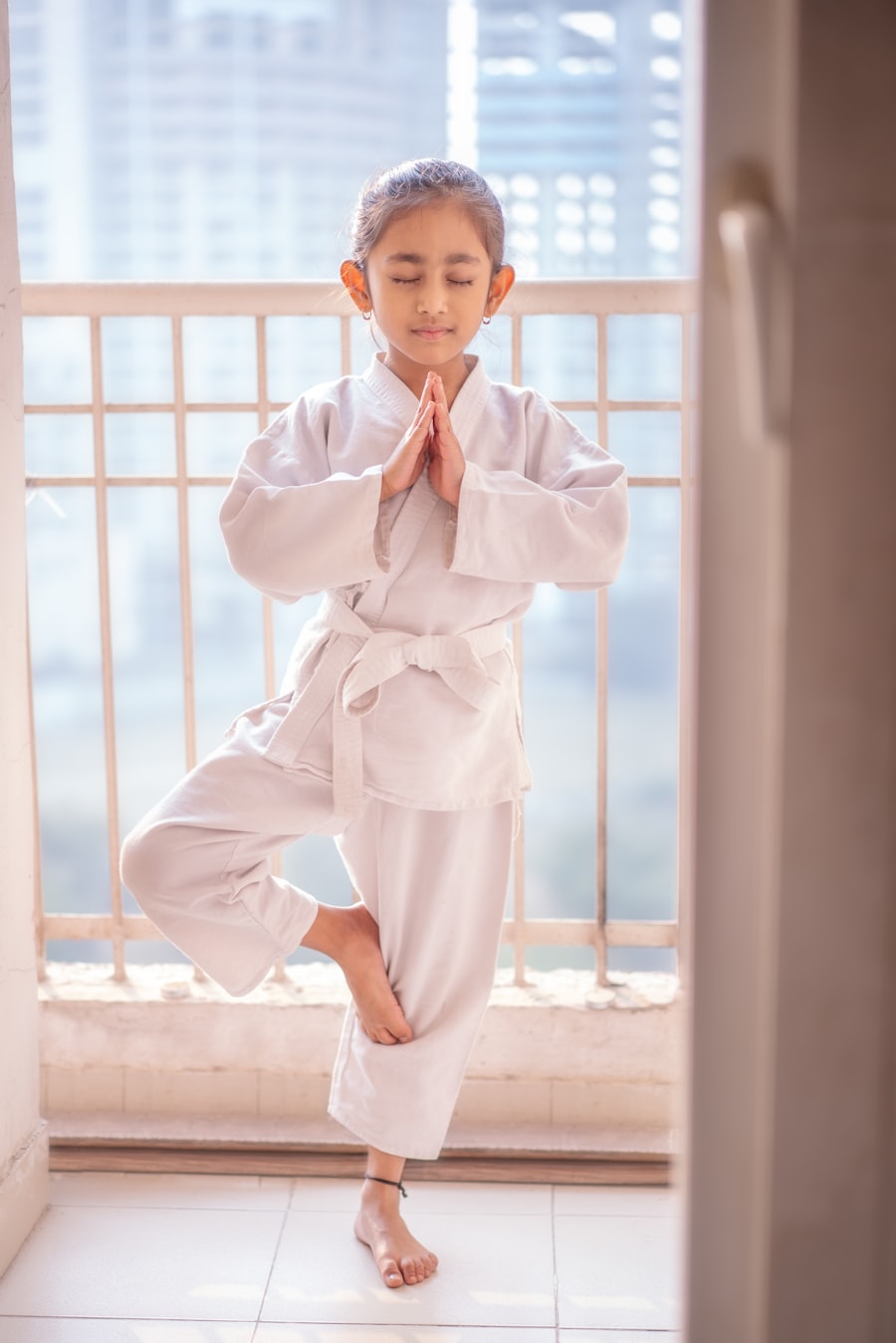 Child focusing in yoga